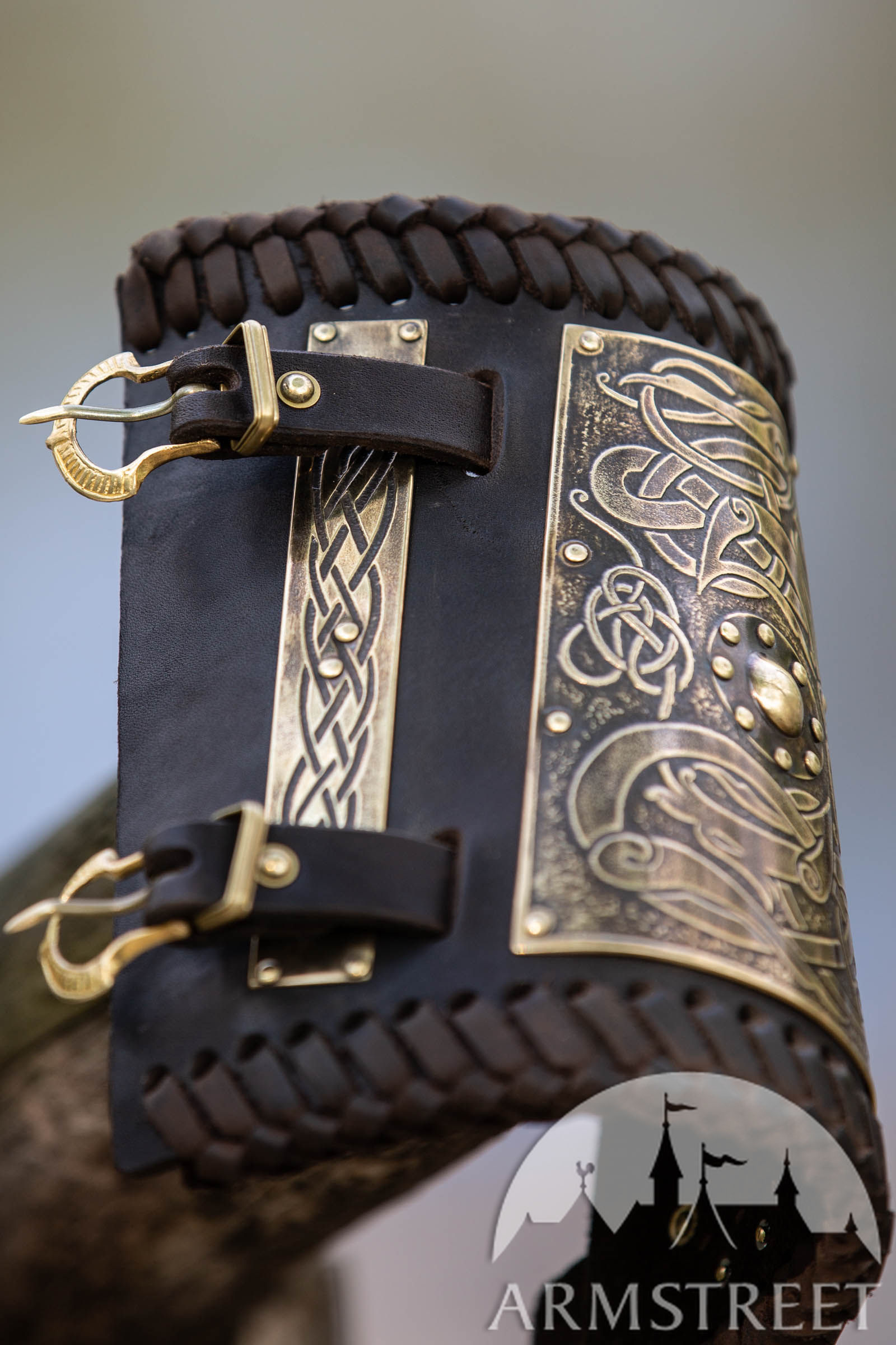 Viking bracers with etched brass accents “Gudrun the Wolfdottir” for sale.  Available in: brown leather, black leather, brass, wolves etching, dragon  etching :: by medieval store ArmStreet