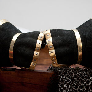 Steel demi-gauntlets covered with black leather