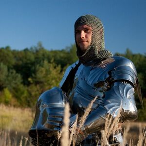 Front view of medieval knight gothic armor set with helmet