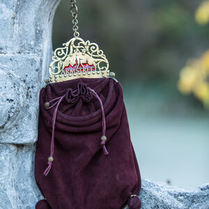 “Renaissance Memories” brass and leather bag with an ornate ArmStreet logo