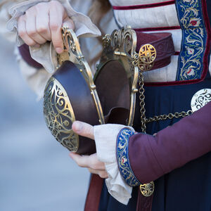 “Renaissance Memories” Spherical leather bag with adjustable straps and brass accents