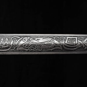 Viking sword LARP weapon made of foam decorated with knotwork and wolves