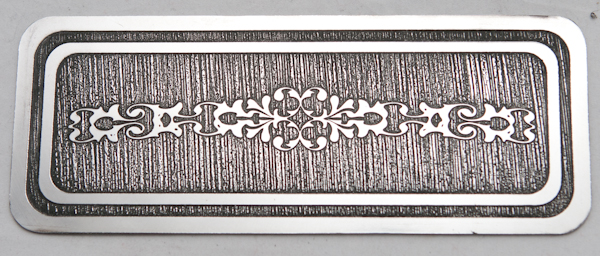 Oblong example of etching at the stainless steel