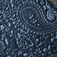 Silver on black embossed leather